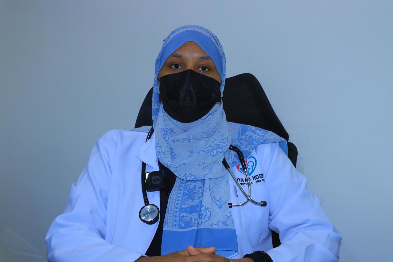 Doctor consulting with patient in clinic setting